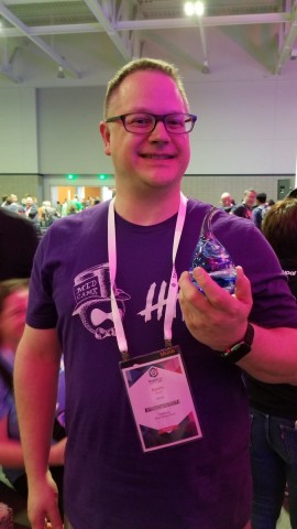 Kevin Thull holding Aaron Winborn Award I made